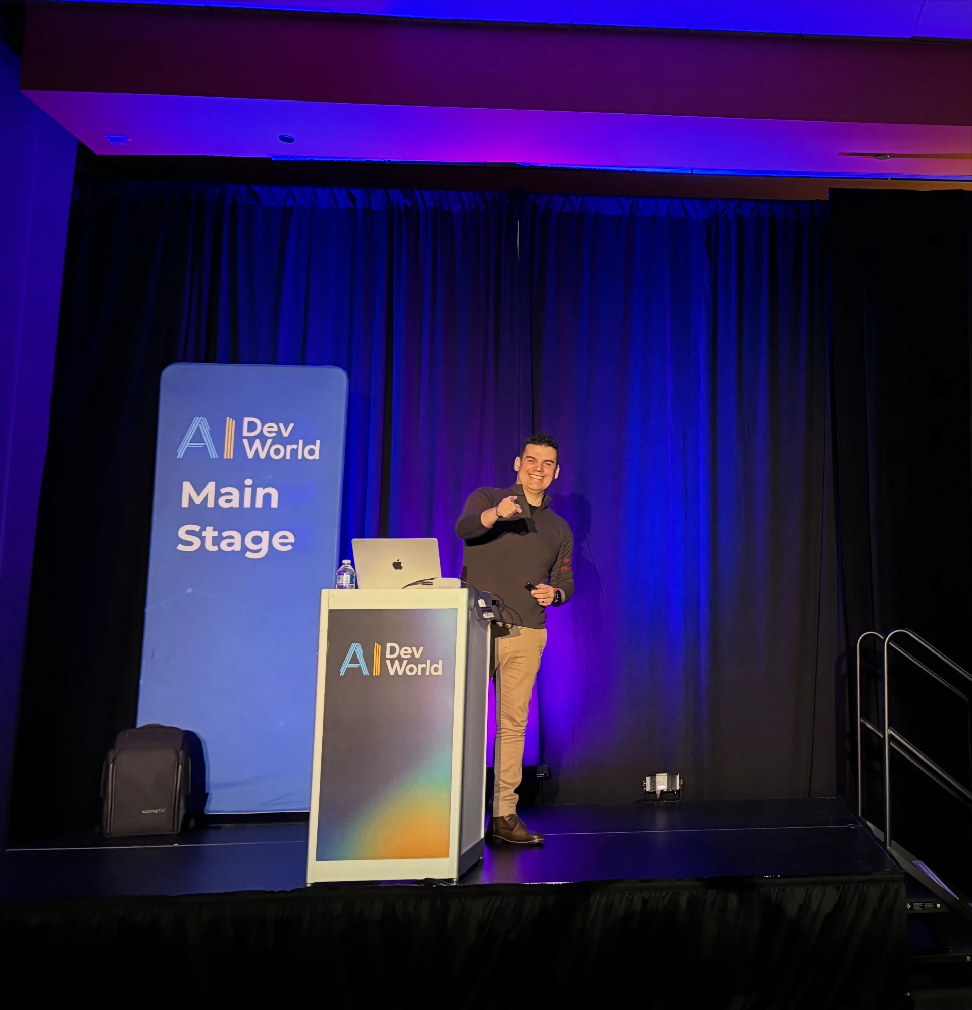 Ricardo Ferreira presenting on the main stage at AI DevWorld